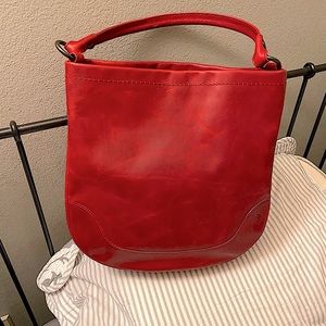 Frye Antiqued leather magnetic closure
10 inches W X 13 inches H X 5